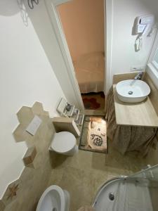 Koupelna v ubytování Lu Bàtil B&B - Rooms