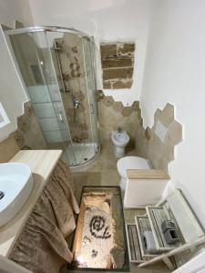 Koupelna v ubytování Lu Bàtil B&B - Rooms