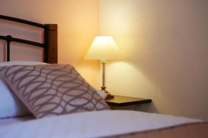Postel nebo postele na pokoji v ubytování Apartments Ivica