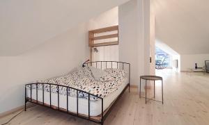 Posteľ alebo postele v izbe v ubytovaní Apartament u Tomka Lux