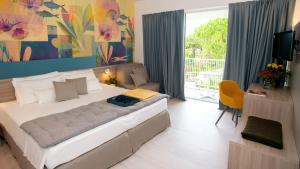 Cama ou camas em um quarto em Hotel President