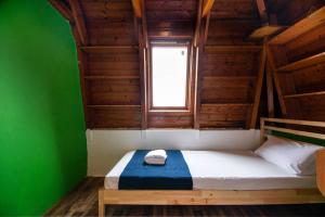 Un pat sau paturi într-o cameră la Mellow Barcelona