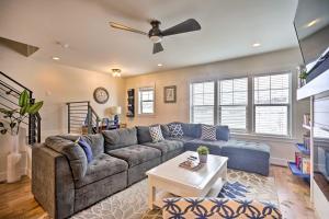 a living room with a couch and a table at Cozy Townhome about 7 Mi to Deer Valley Resort in Keetley Junction