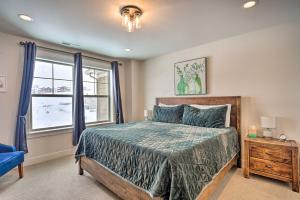 a bedroom with a bed and a window at Cozy Townhome about 7 Mi to Deer Valley Resort in Keetley Junction