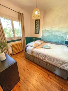 Posteľ alebo postele v izbe v ubytovaní Beach house idéale pour famille, 400 m de l’océan