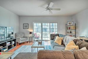 a living room with a couch and a ceiling fan at Rehoboth Beach Vacation Rental with Porch! in Rehoboth Beach