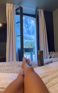 Posteľ alebo postele v izbe v ubytovaní Hôtel du cirque et de la cascade