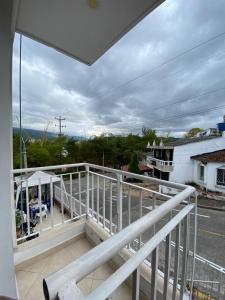 a balcony of a house with a view of a street at Hospedaje Balcones de la Colina in Floridablanca