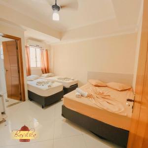 Ένα ή περισσότερα κρεβάτια σε δωμάτιο στο Basilica Palace Hotel