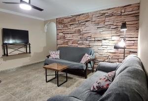 Posezení v ubytování Apartamentos Los Robles