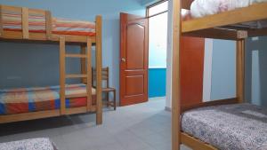 Postel nebo postele na pokoji v ubytování IntiPunku + 10 fotografií