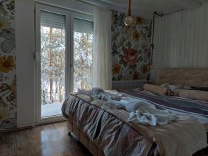 Cama o camas de una habitación en Divčibarski M.S.A. kutak