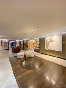 Uma área de estar em Studio Hotel Boutique