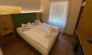 Postel nebo postele na pokoji v ubytování Hotel Trieste