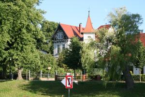 a house with a no parking sign in front of it at Villa Seeschwalbe Plau in Plau am See