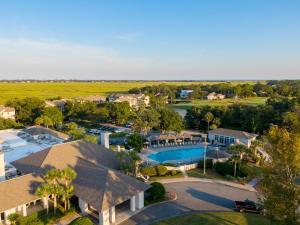 an aerial view of a resort with a pool and resort at Sea Palms Resort in Saint Simons Island