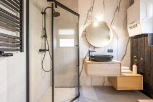 Kúpeľňa v ubytovaní Furmanova Chalets + 37 fotografií