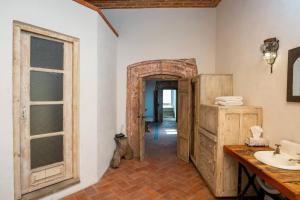 a bathroom with a sink and a mirror at Amapola Loft in San Miguel de Allende