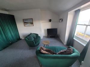Гостиная зона в Sea view Penthouse flat 6 with fast WiFi and Free PARKING