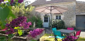 En have udenfor Charmante maison de campagne