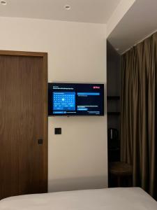 TV a/nebo společenská místnost v ubytování PALMERA HAGIA SOPHIA hotel