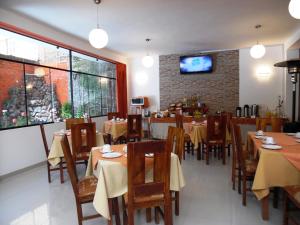 ห้องอาหารหรือที่รับประทานอาหารของ Hotel Puno Terra