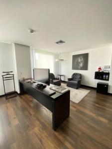 Uma área de estar em Studio Hotel Boutique