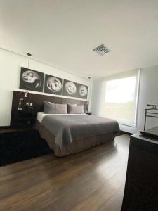 Uma cama ou camas num quarto em Studio Hotel Boutique
