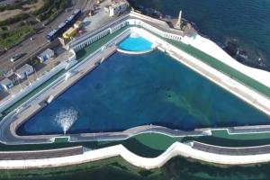 an overhead view of a large pool of water at Cosy cottage in the beautiful Lamorna Valley - walk to the pub & sea in Paul