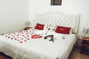 Postel nebo postele na pokoji v ubytování Hotel Feimar