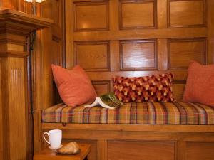 a couch with pillows on it in a room at Adirondack Mountain View Retreat in Elizabethtown +19 photos