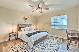 a bedroom with a bed and a ceiling fan at Plant City Home and Guest House with Outdoor Pool! in Plant City +37 photos