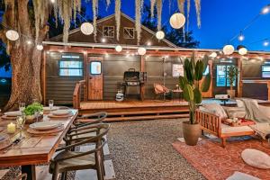 A restaurant or other place to eat at Charming Tiny Home with Private Hot Tub!