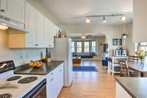 a kitchen with white cabinets and a counter top at Delafield Vacation Rental Near Lakes and Parks! in Delafield