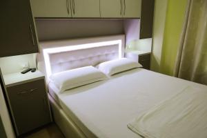 Katil atau katil-katil dalam bilik di Hotel Celiku