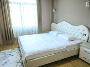 Katil atau katil-katil dalam bilik di Hotel Celiku