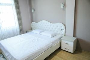 Katil atau katil-katil dalam bilik di Hotel Celiku