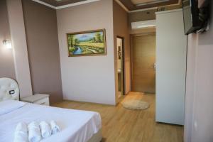 Katil atau katil-katil dalam bilik di Hotel Celiku