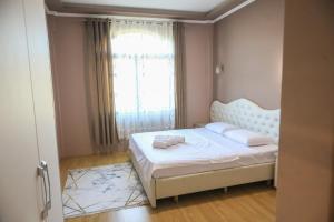 Katil atau katil-katil dalam bilik di Hotel Celiku
