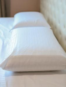 Katil atau katil-katil dalam bilik di Hotel Celiku