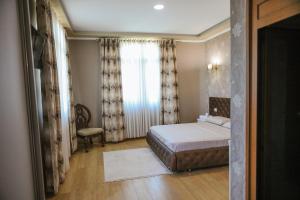Katil atau katil-katil dalam bilik di Hotel Celiku