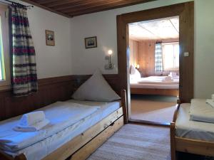 Postel nebo postele na pokoji v ubytování Bücheler OG