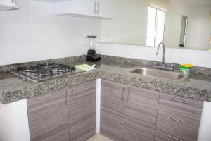 Kuchyň nebo kuchyňský kout v ubytování Apartamento en Valledupar - Casa Canaán