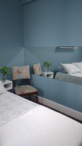 Katil atau katil-katil dalam bilik di Apartamento/Studio centro florianopolis