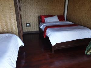 Letto o letti in una camera di Miley Lodging Restobar