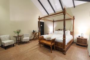 A bed or beds in a room at The Riverside Inn