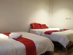 Letto o letti in una camera di Miley Lodging Restobar