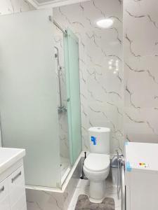 A bathroom at Люкс квартира в центре города Шымкент