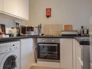 A cozinha ou cozinha compacta de Magnolia Cottage