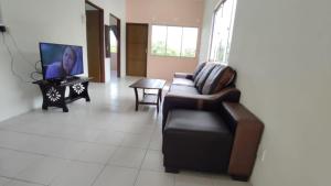 TV a/nebo společenská místnost v ubytování Pusing Holiday Apartment